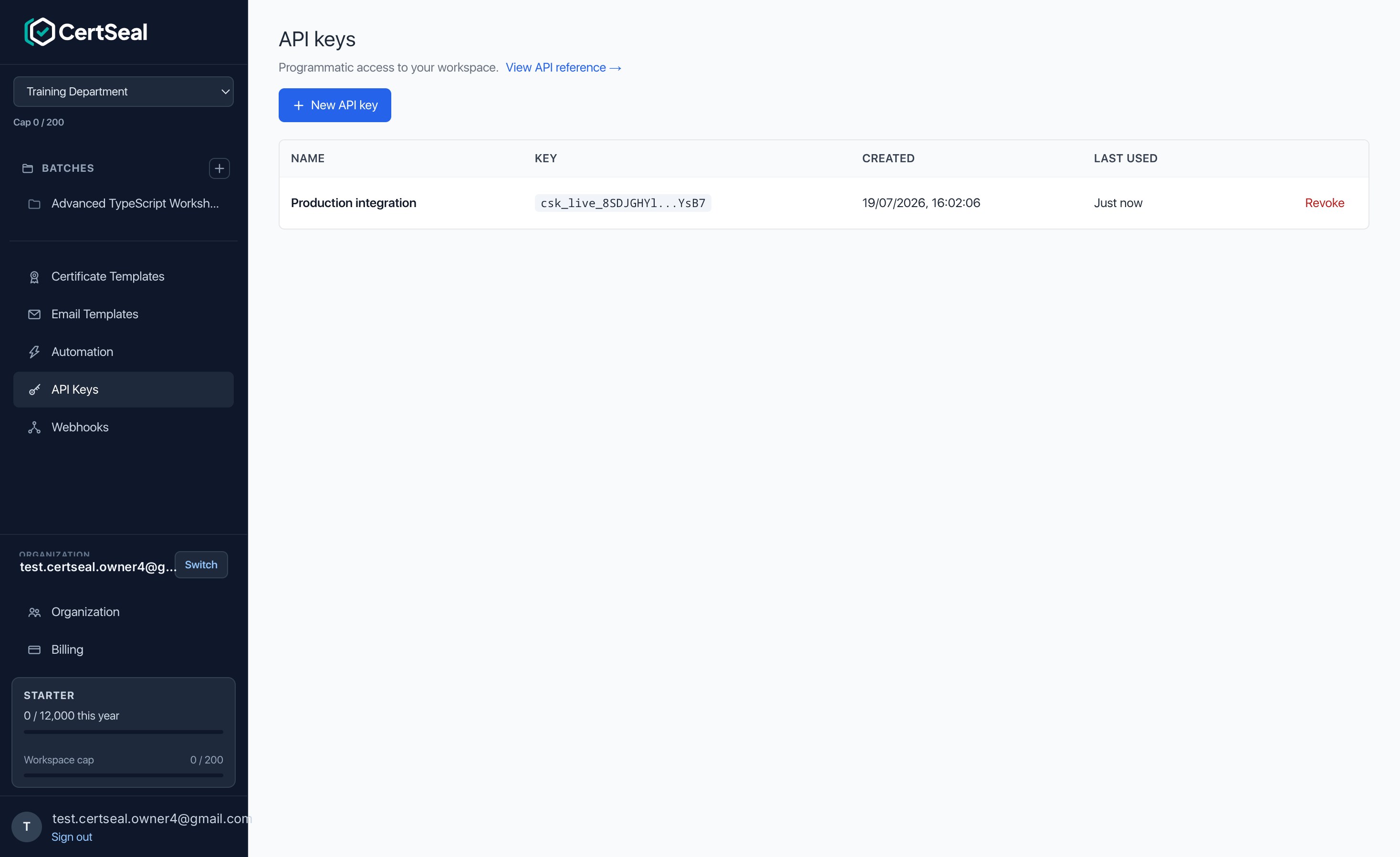 The API keys list showing a key with its name, masked identifier, created date, last used time, and a Revoke action